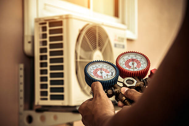 Professional Air Conditioning Service technician working in Morongo Valley, CA